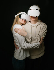 Romantic couple portrait in virtual reality. Relationship online. Black background vertical composition.  Artistic creative composition. Virtual love romance family