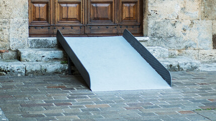 platform to allow wheelchair access to a wooden door