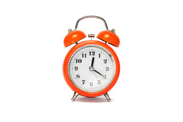 Red old style alarm clock isolated on white.