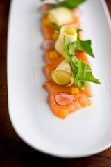 Sashimi sushi. Classic Traditional Japanese cuisine. Raw fish-salmon tuna, mackerel, fluke, bass--sliced very thin and served with a variety of garnishes pickled ginger and wasabi and sauces. 