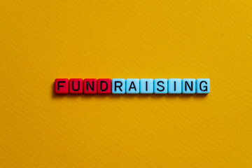 Fundraising - word concept on cubes