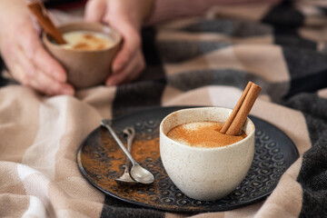 Traditional hot drink salep on background, selective focus	