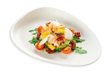 Warm salad with shrimp, arugula, parmesan and tomatoes, served on a plate, isolated on a white background