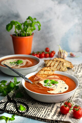 Tomatoe cream soup with cream and basil