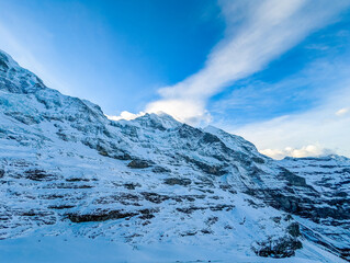 Ski slopes and mountains in Jungfrau ski resort in Swiss Alps, Grindelwald, Switzerland