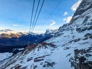 Ski slopes and mountains in Jungfrau ski resort in Swiss Alps, Grindelwald, Switzerland