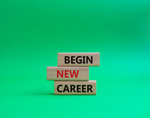 Begin new career symbol. Concept word Begin new career on wooden blocks. Beautiful green background. Business and Begin new career concept. Copy space