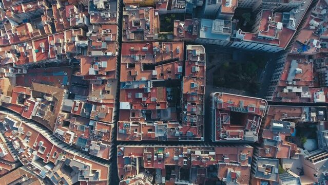 Top down footage of large church and surrounding buildings. Cathedral of Barcelona with gothic tower. Barcelona, Spain
