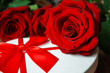 red rose on a wooden background. Valentine's Day gift.selective focus.