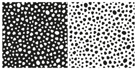 Set of abstract irregular dotted seamless repeat pattern. Random placed, vector all over minimal surface print in black and white.