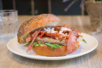 Authentic top quality American Burger with bacon, egg and salad.