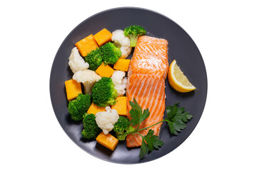 plate of grilled salmon fillet with vegetables isolated on transparent background, top view