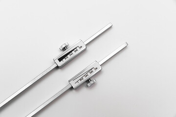 tuning fork C 128 on a white background with gradation