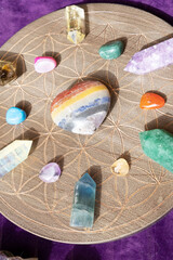 Healing crystals on brown background