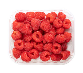 Whole fresh raspberries, in a clear plastic punnet, from above. Ripe, red and sweet fruits of Rubus...