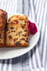 fruit cake dessert traditional pastry dried fruits, nuts meal food snack on the table copy space food background rustic top view