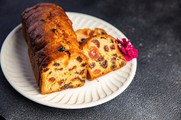 fruit cake dessert traditional pastry dried fruits, nuts meal food snack on the table copy space food background rustic top view