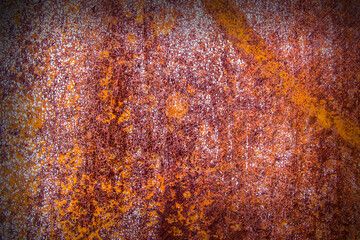 Old cracked paint in craquelure on a rusty metal surfaceGrunge rusted metal texture. Rusty corrosion and oxidized background. Worn metallic iron rusty metal background.