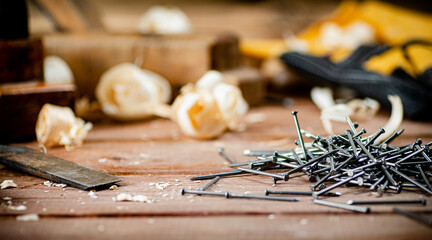 A pile of nails on the table. 