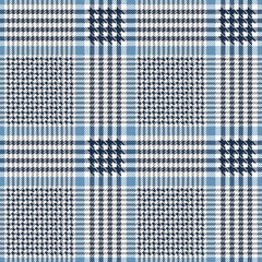 Blue and white houndstooth pattern. Scottish check plaid, fabric swatch close-up. 