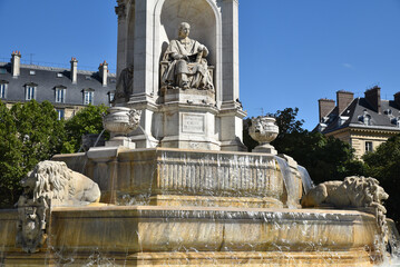Fototapeta na wymiar Fontaine de la place Saint-Sulpice à Paris. France