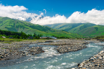 Stormy mountain river flowing among the stones. North Caucasus. Russia