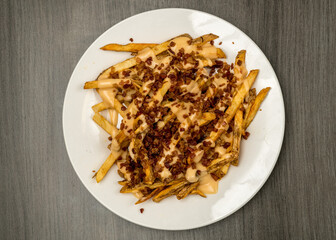 Fries with bacon and cheese