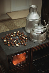 chestnuts cooked in the oven. scratched shelled chestnut. ready-to-eat chestnuts on cooker cast...