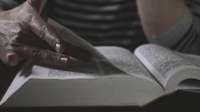 I open and read the Bible Slow Motion