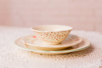 Closeup of porcelain plates and bowls