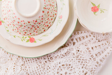 Closeup of porcelain plates and bowls