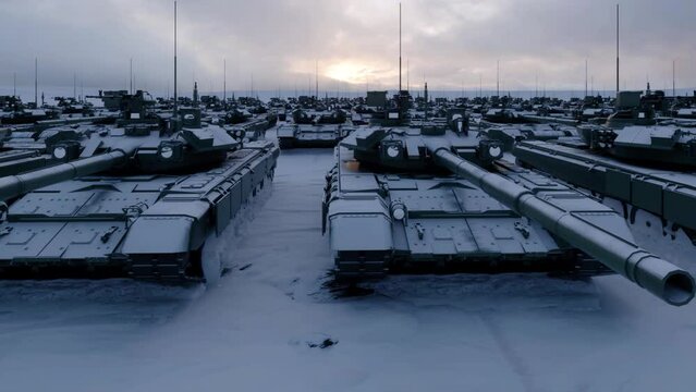 Military armored tanks immobilized and unable to move due to heavy snow and freezing conditions.