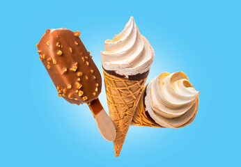 Ice cream in glaze on wooden sticks and ice cream in a waffle cup. Isolate on a blue background