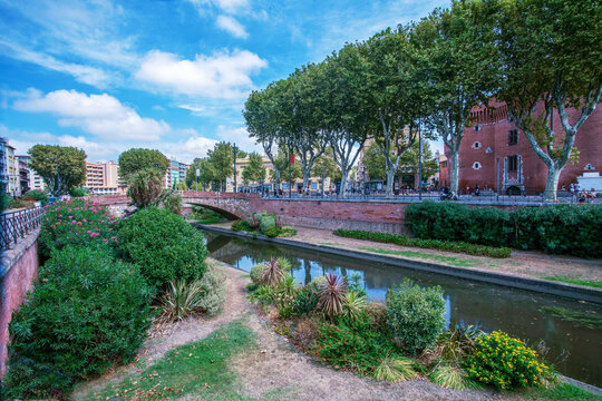 Perpignan - city center with Bassa river and Le Castillet fortress and Quai Nicolas Sadi Carno