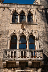 Ancient palace building facade in the Old City of Trogir, Croatia