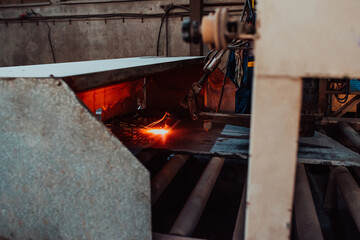 Stone processing factory. Burning granite stone in heavy industry