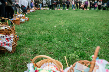 Parishioners of the church at the church service on the day of the right-wing Easter with baskets of food in anticipation of the consecration of Easter cakes and eggs.