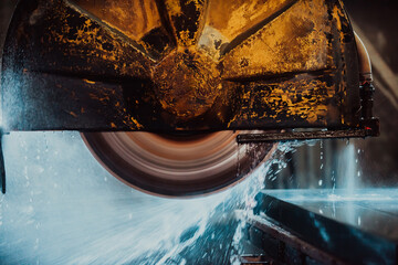 A stone cutter processes stone and granite slabs in the industry