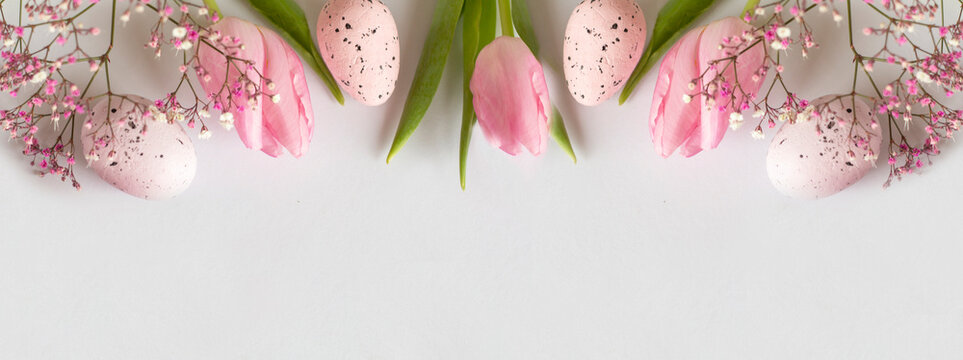 Easter background. Happy easter eggs. Easter eggs. Happy Easter card. Multi-colored Easter eggs. Tulips. Banner. Copy space
