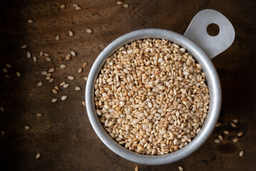 Roasted Sesame Seeds in a Measuring Cup
