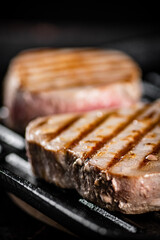 Tuna steak in a grill pan. 