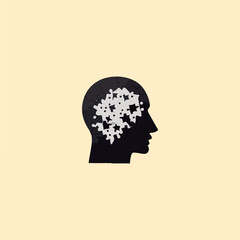 silhouette of a thinking head and a puzzle symbol on the head