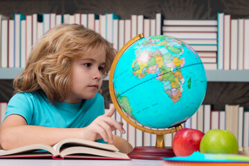 Back to school. Funny little child from elementary school with book. Education. Kid study and learning.