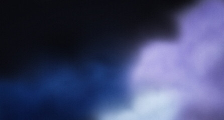 Blurred colored smoke on black background, purple blue white colours with grainy effect in dark, copy space
