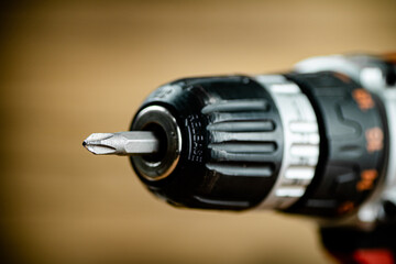 Working tool. Screwdriver. On a wooden background.