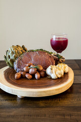 Roasted Prime Rib Steak with buttered artichoke, rosemary roasted small red potatoes
