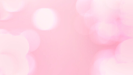ピンク色の光。玉ボケ。ぼやけた光。春のイメージ。