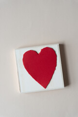 red heart on a wooden background