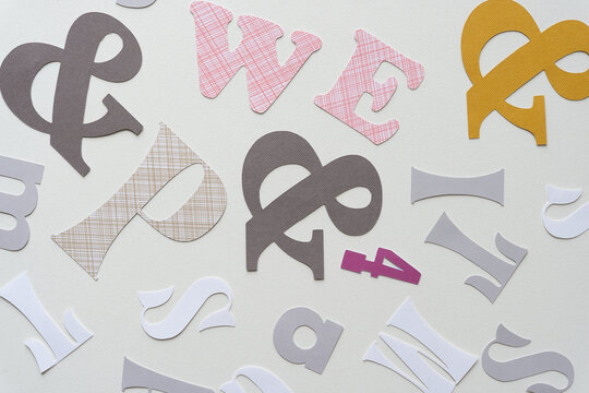 typographic background featuring large letters and symbols