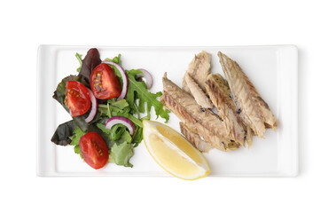 Plate with delicious canned mackerel fillets, lemon and salad on white background, top view